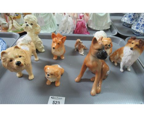 Tray of ceramic dogs, various to include: Poodle, Corgi, Beswick Beagle pups, Border Fine Art Shetland Sheep Dog, some Sylvac