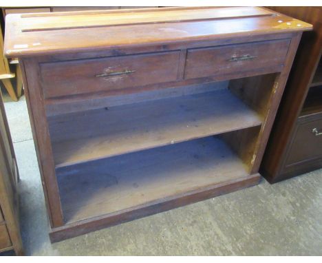 Pitch pine probably original dresser base, missing its rack, having two drawers and fitted shelf. (B.P. 21% + VAT) 