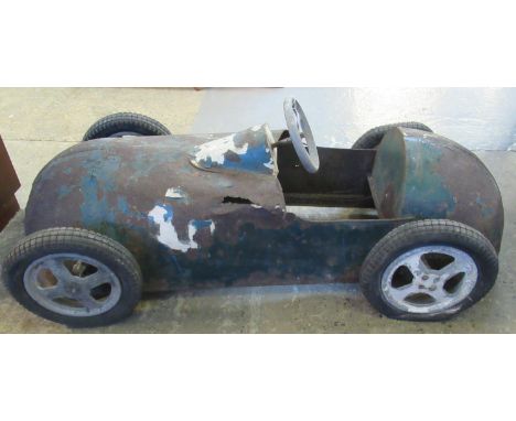 Mid Century child's metal pedal car in the form of a front engine single seater racing car believed made by Austin Motor Comp