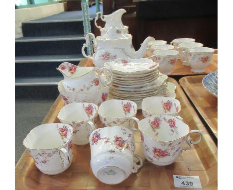 An Aynsley 1930's 21 piece bone china rose design part teaset to include; teacups, milk jug, sucrier, various plates and sauc