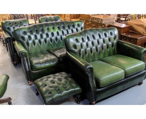 A Thomas Lloyd leather button backed five piece lounge suite comprising; two seater sofa, three seater sofa, two easy chairs 