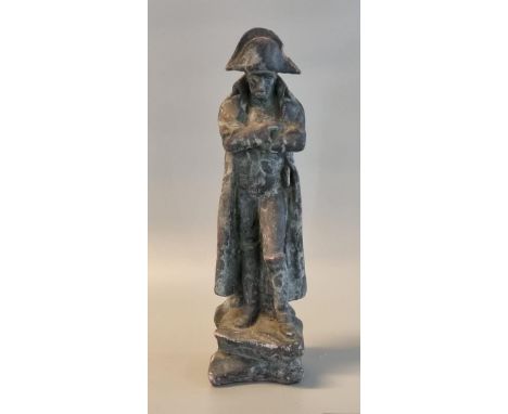 Hollow ceramic figure of Napoleon Bonaparte in pensive pose on rock. 35cm high approx.(B.P. 21% + VAT) Overall surface wear a
