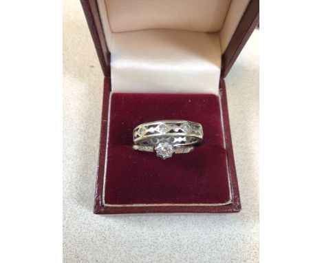 An illusion set diamond ring in A/f condition - no hallmark also with another ring marked 9 ct. Opal weight 4 gm. Box not inc