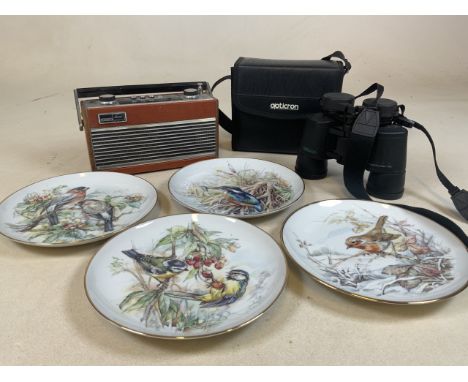 A cased pair of Opticron binoculars a Roberts radio and four bird plates to include a stunning kingfisher also with a modern 