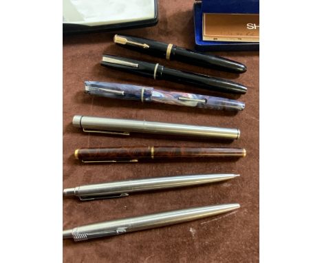 A collection of pens to include Osmiroid 65, Parker Duofold with 14k nib, Osmiroid rolatip, Sheafer ball point, Parker propel