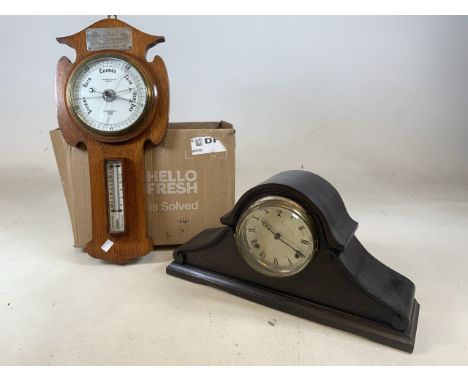 An American striking mantle clock circa 1920s by Gilbert clock company USA also with an mid 20th century oak barometer and th