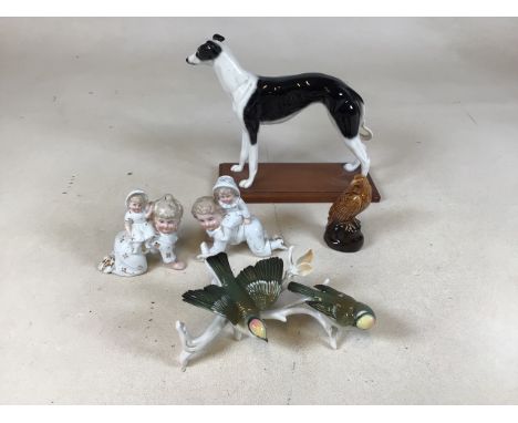 A Karl Ens two bird ornament, a ceramic greyhound on wooden stand ( A/F crack to leg) also with a Beswick Eagle filled with S