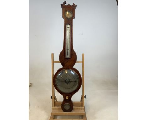 A Georgian walnut inlaid barometer and thermometer by J Martin, Maidstone with spirit level and dry damp meter. With original