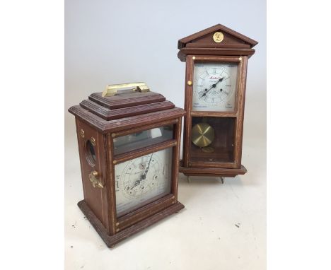 Two hand built clocks one with Kieninger German movement. Hand built in Chipping Sodbury, The Old Stable, signed Michael in r