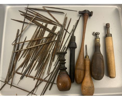 A large quantity of gravers and handles used for engraving watch movements and clock back plates.