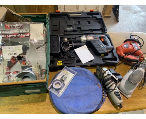 Various tools, tile cutters, extreme 24v drill, sander etc. 