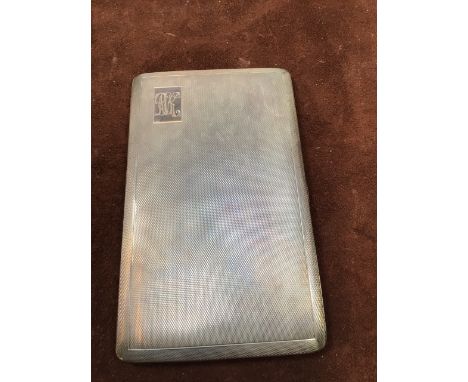 A silver Cigarette case with engraved initials - silver hall mark to interior Birmingham ES &amp; Co 1945.  Total weight 194 