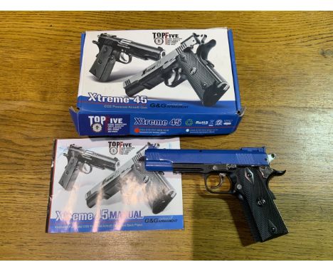 An Extreme 45bv co2 powered air soft gun. In box with manual. 