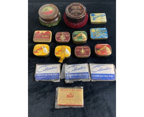 A collection of vinatge 78s record player needle tins also with two record cleaners. 
