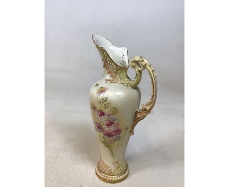 Royal Worcester blush ivory hand painted ewer with part reticulated rim, numbered 1587. Decorated with wild flowers. Wear to 