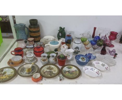 A mixed lot of glassware and ceramics to include a 19th century cranberry twin handled goblet, a Chinese vase, Crown Devon Ri