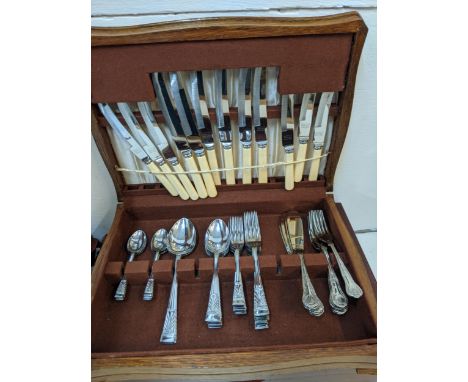 A Viners silver plated canteen of cutlery in a mahogany finished case, and another with additional Kings pattern flatware Loc