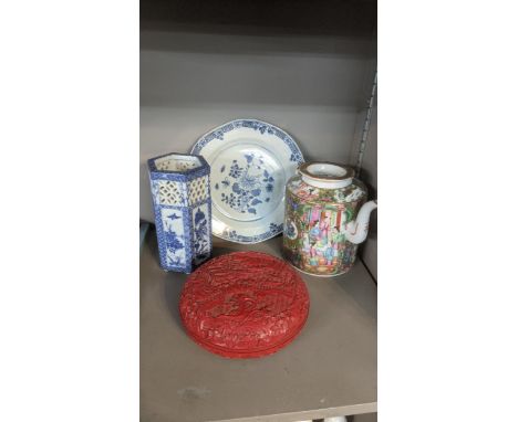 A Chinese 18th century blue and white plate, late 19th century famille Rose canton teapot, a blue and white Japanese vase and