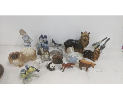 A mixed lot of porcelain models to include Beswick model animals, Lladro Nao figures and others Location:If there is no condi