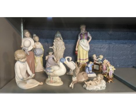 A group of porcelain figures to include Lladro, Lladro nao and other figuresLocationIf there is no condition report shown, pl