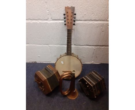 A 1920's Oscar Schmidt Stella 8-string banjo, measures 23" long, no Oscar Schmidt label to head. Location:RWFIf there is no c