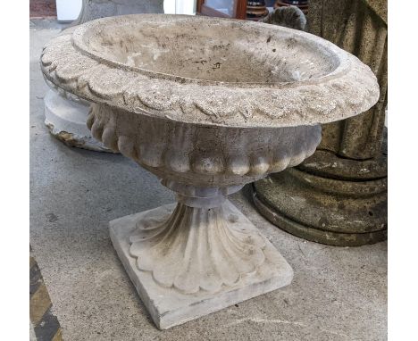 A garden stoneware planter in the form of an urn, with an  egg and dart rim, 53.5cm h x 63cm wLocation:If there is no conditi