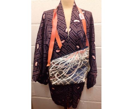 Abi-K- An embroidered handbag and pair of pink, black and cream cuffs in original boxes together with a hand-stitched hip-len