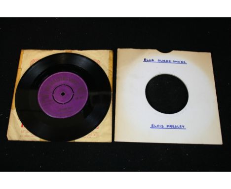 ELVIS PRESLEY - An original UK pressing of Blue Suede Shoes b/w Tutti Fruitti, issued on HMV in 1956 (7M 405). The record is 