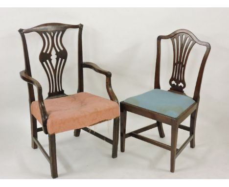 A Chippendale style mahogany elbow chair, and a pair of Hepplewhite style mahogany chairs