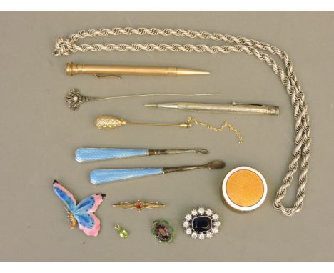 A sterling silver Yard o' Lead propelling pencil, a gold bar brooch set with a doublet and marked 9ct, a 9ct gold peridot pen