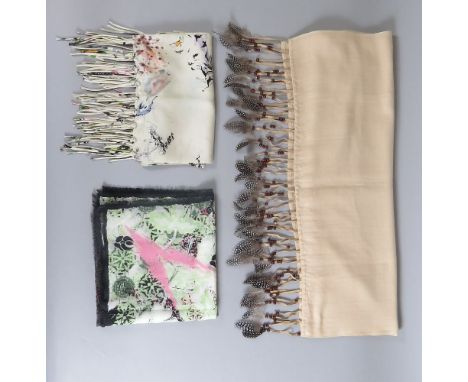 A Hayley Menzies of London cream pashmina and silk shawl, with leather tassel ends, bead and feature detail, 200 x 73.5cm, a 