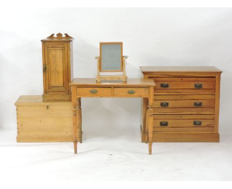 A satin walnut chest of drawers, a pine trunk with candle box and tray, 75.5cm wide, a pine side table, 89cm wide, a toilet m