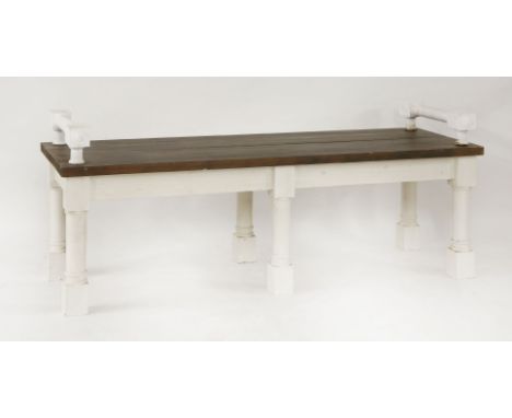 A modern white painted hall bench, with pine top