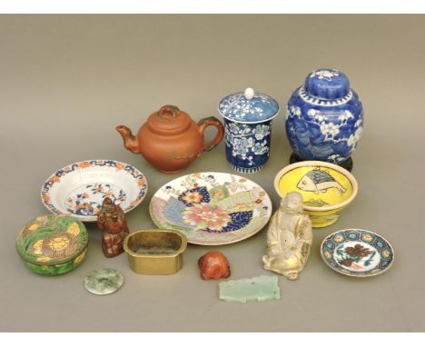 Chinese and Japanese 18th century and later porcelain, pottery and jade, to include a Yixing teapot, jade carvings, figures, 