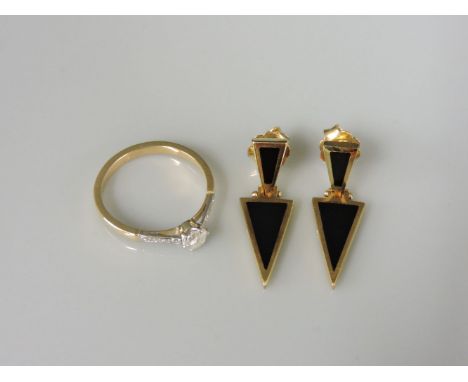 A single stone diamond ring, with engraved shoulders, and a pair of 9ct gold hinged drop earrings inlaid with triangular onyx