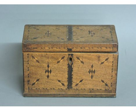 A George III mahogany and chequer inlaid tea caddy, 20.5cm wide