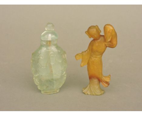 A 19th century Chinese jade figure, 8.5cm, and a snuff bottle