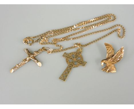 A 9ct gold Celtic cross, a 9ct gold crucifix, both suspended on a 9ct gold filed curb chain, and a 9ct gold eagle pendant, 11