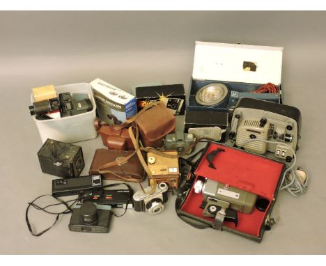 A quantity of mixed 20th century cameras, including a Super 8 camera, and projector