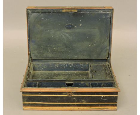 A 19th century metal military style deed/writing box, with carrying handles, and plaque beneath 'Army & Navy, Calcutta'