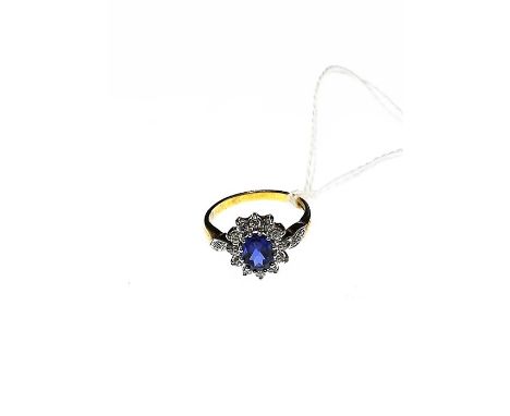 Brooks &amp; Bentley "Royal Gift of love" ring sterling silver plated in 22 carrat gold with faux sapphire surrounded by 12 c