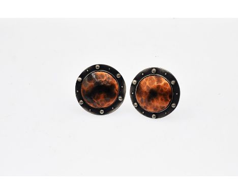 A Pair of arts &amp; craft style cufflinks, pewter &amp; copper