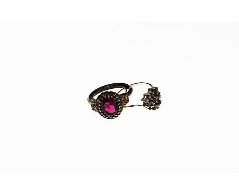 A silver and gold plated ruby ring and amethyst diamond cluster ring  