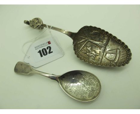 A William IV Hallmarked Silver Fiddle Pattern Caddy Spoon, London 1835, with fruiting vine engraved bowl; together with a Dut