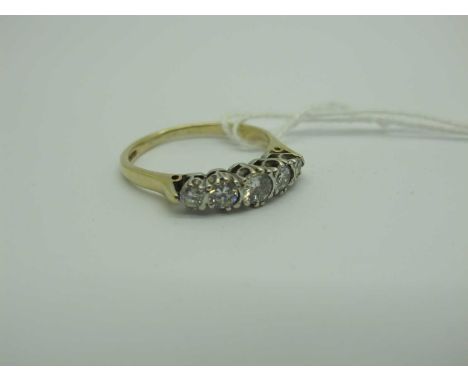 A Modern 9ct Gold Five Stone Dress Ring, (finger size S) (2.8grams).