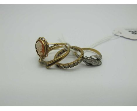 An Illusion Set Dress Ring, stamped "18ct Plat" (finger size J) (2 grams), a 9ct gold cameo ring, between bifurcated shoulder