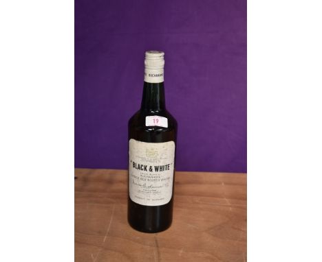 A bottle of Black &amp; White Buchanan's Choice Old Scotch Whisky having screw top, numbered 1193, no strength or capacity st