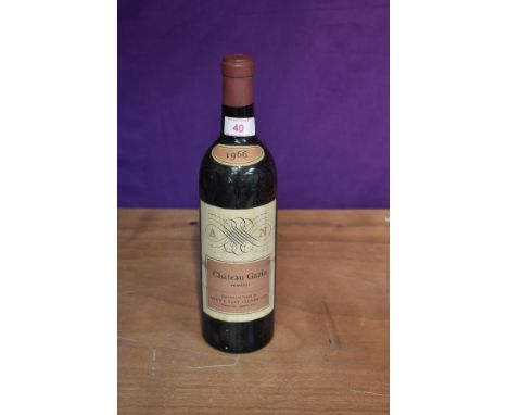 A bottle of Chateau Gazin 1966 Pomerol, Imported and Bottled by Army &amp; Navy Stores Ltd, Westminster, London SW1, no stren