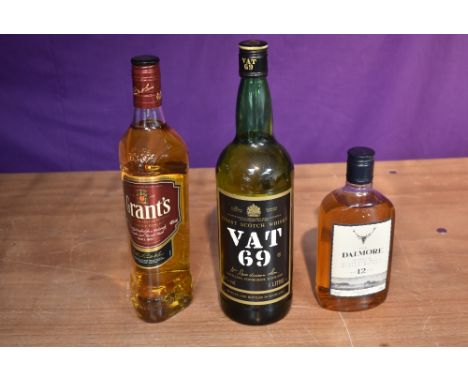 A bottle of Vat 69 Finest Scotch Whisky 40% vol 1 Litre, a bottle of Grants Blended Scotch Whisky 70cl 40% vol and a plastic 