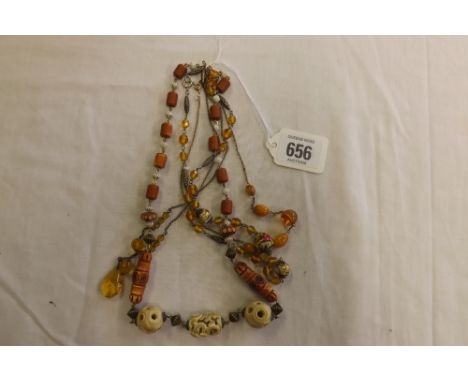 FOUR VINTAGE NECKLACES